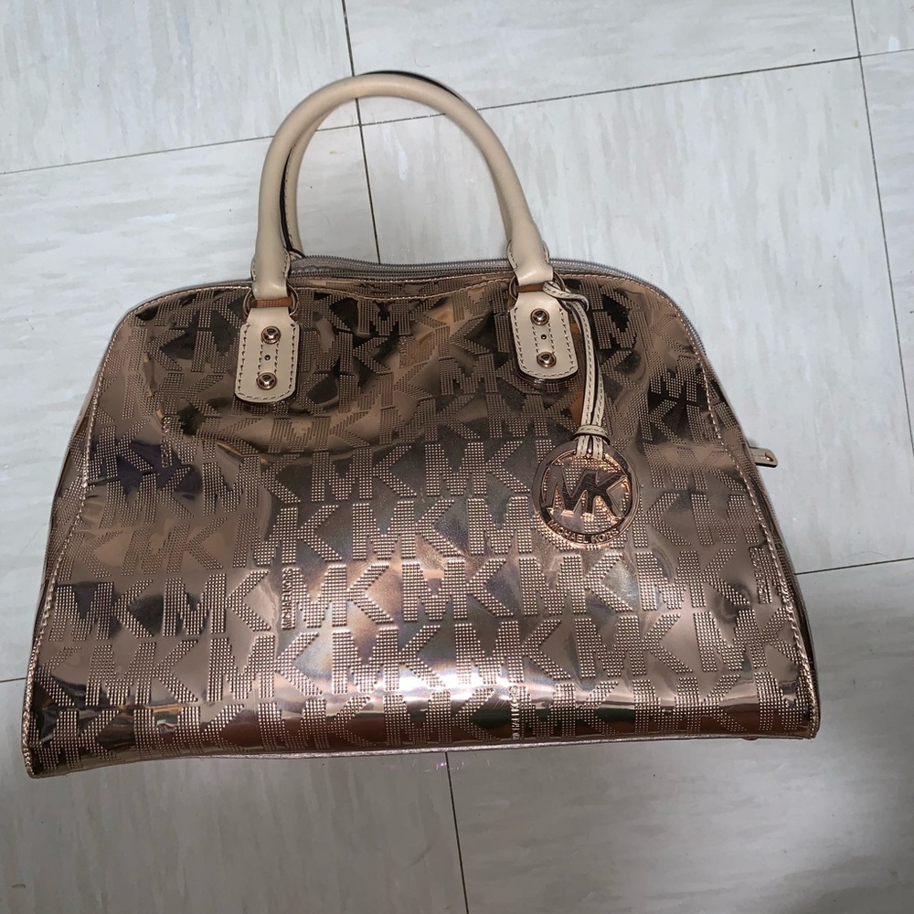 Metallic rose gold Michael Kors purse